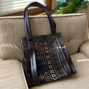 Vintage brown leather carpet bag